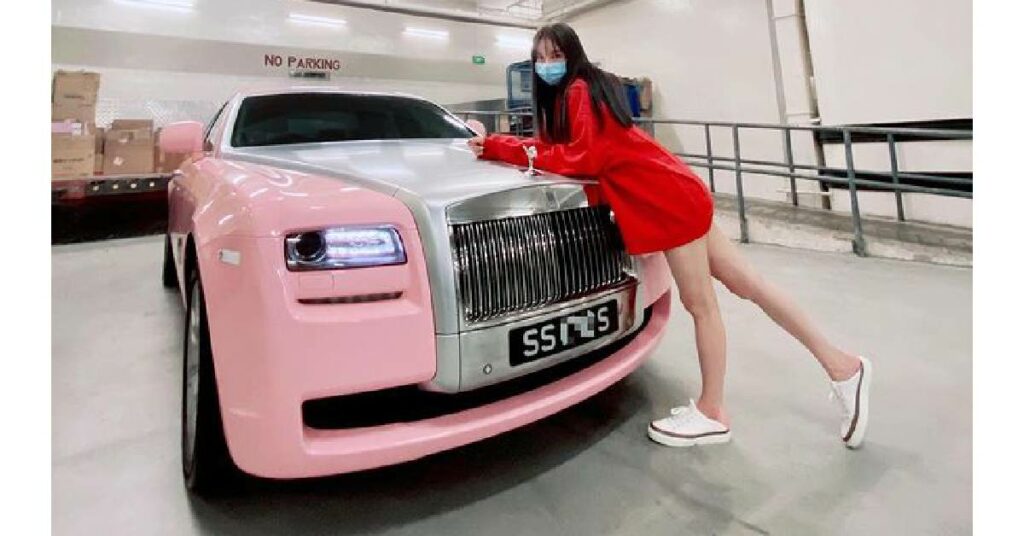 Kim Lim with her Rolls Royce Cullinan