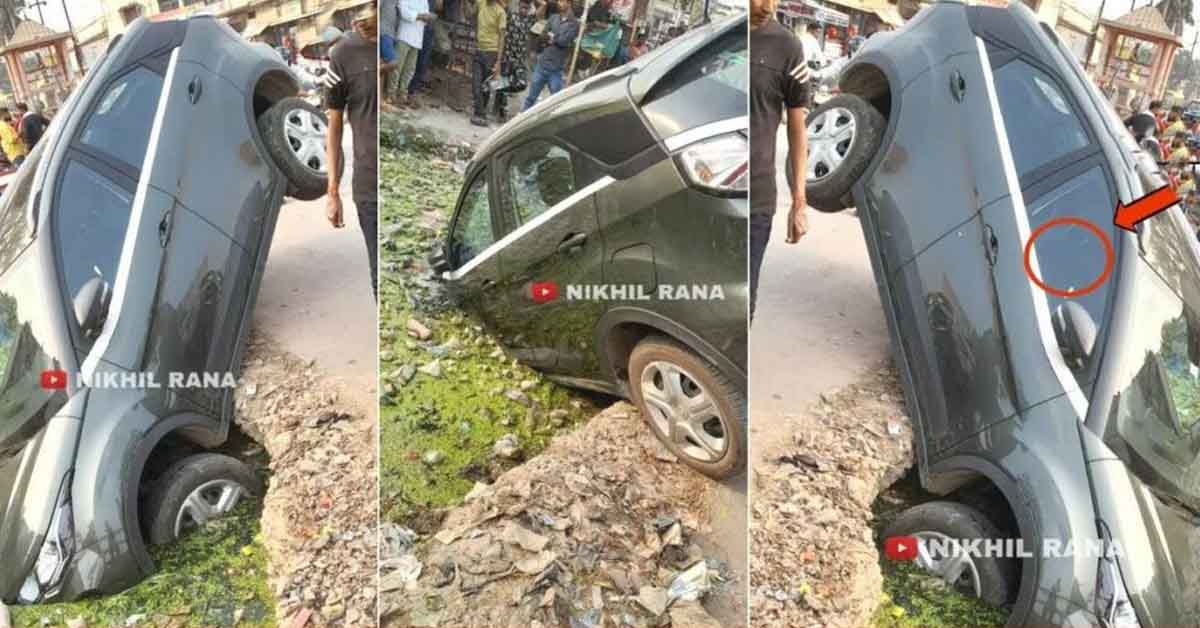Tata Nexon falls into a pothole on the side of the road| Roadsleeper.com