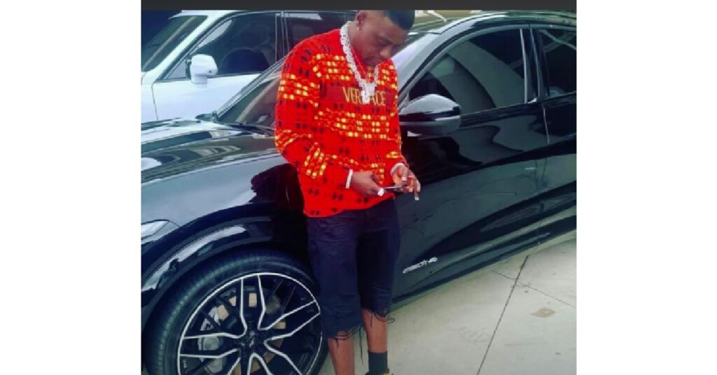 Boosie Badazz with his Mustang Mach E