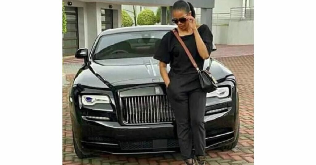 Connie Ferguson with her Rolls Royce Phantom