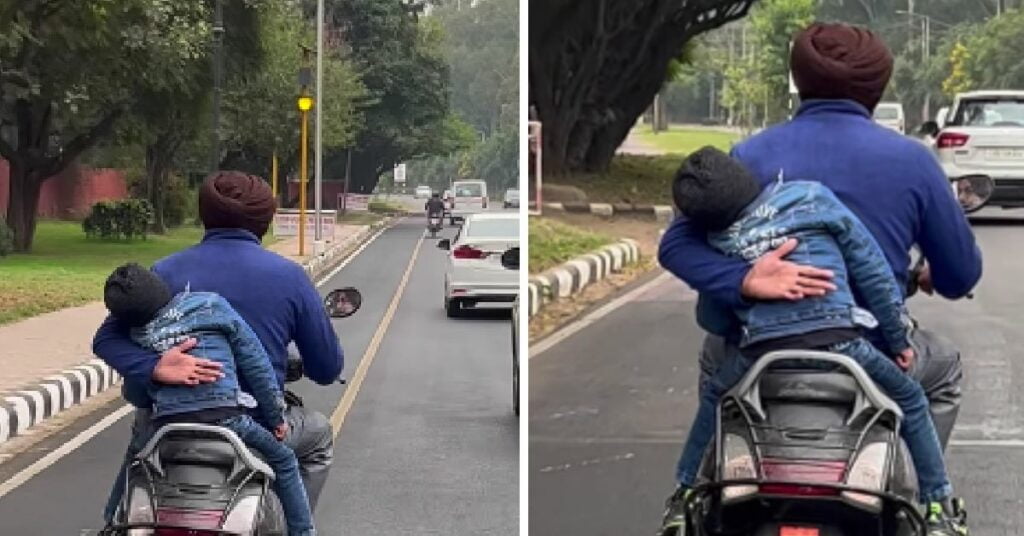 Father Holding His Child While Riding a Scooter