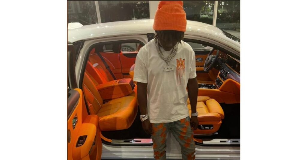 Jackboy with his Rolls Royce Ghost