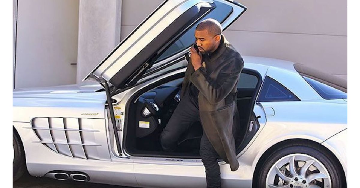 kanye west with his mercedes-benz slr mclaren