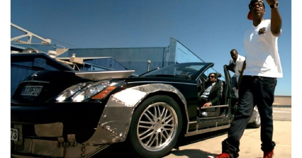 Kanye West with his Maybach 57