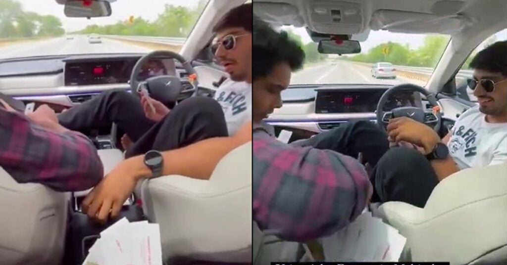 Mahindra XUV700 owner playing cards with his friends as SUV drivers through ADAS