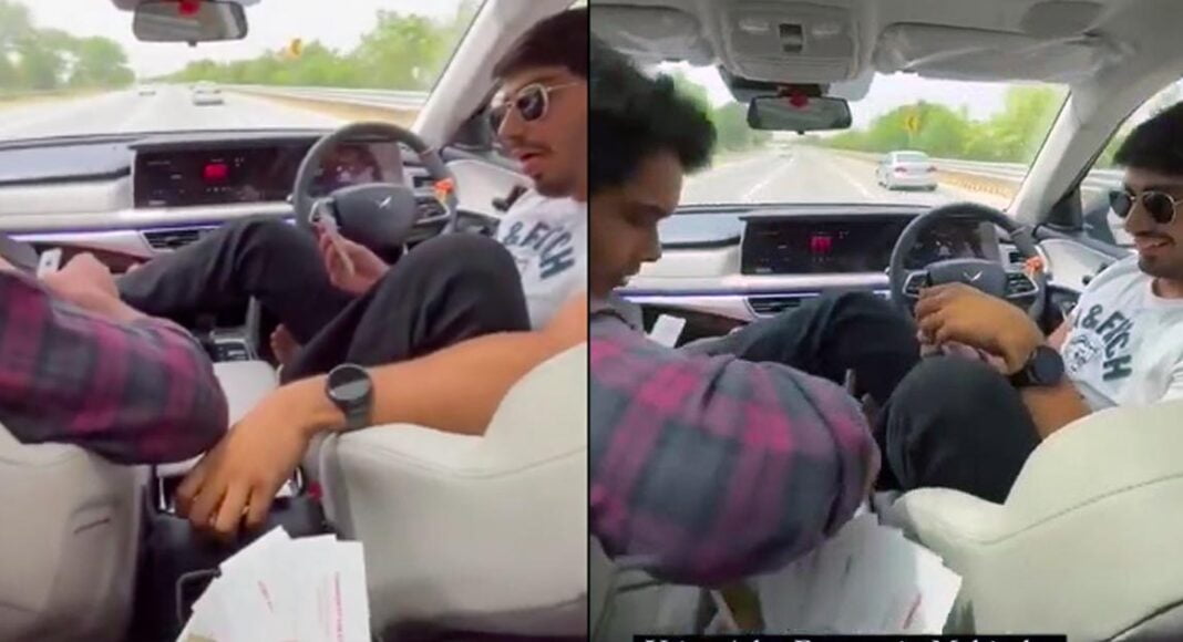 Mahindra XUV700 owner playing cards with his friends as SUV drivers through ADAS