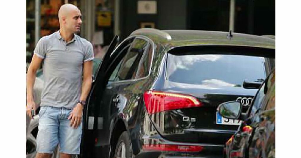 Pep Guardiola with his Audi Q5
