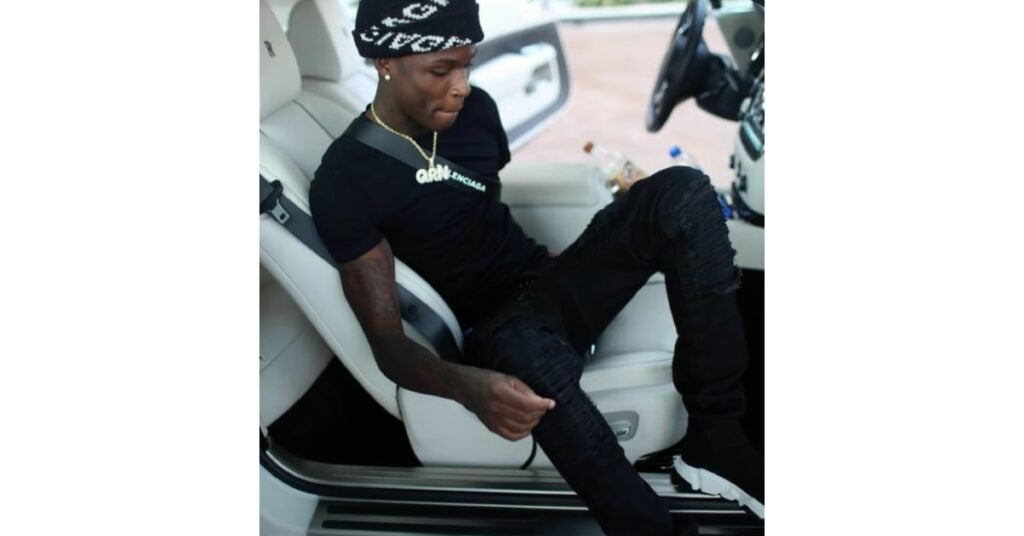 Quando Rondo with his Rolls Royce Wraith