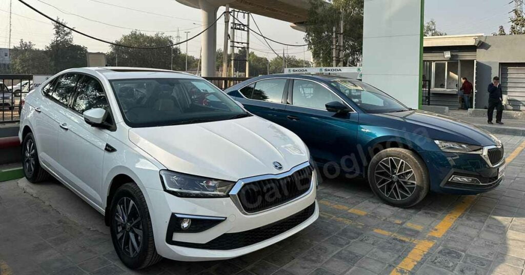 Skoda Slavia and Octavia parked at a dealership.