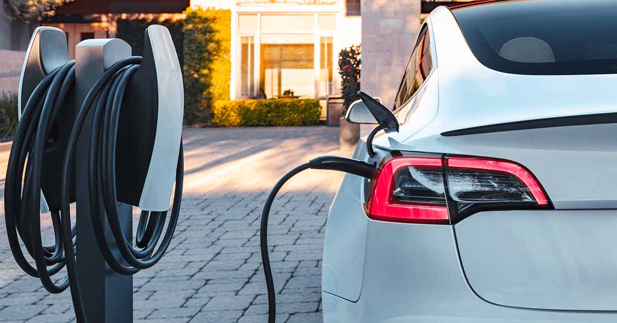 A Tesla using destination charging network