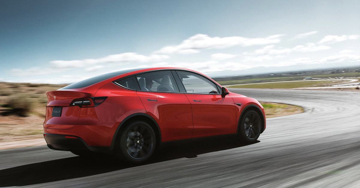 Tesla Model Y red rear three quarters