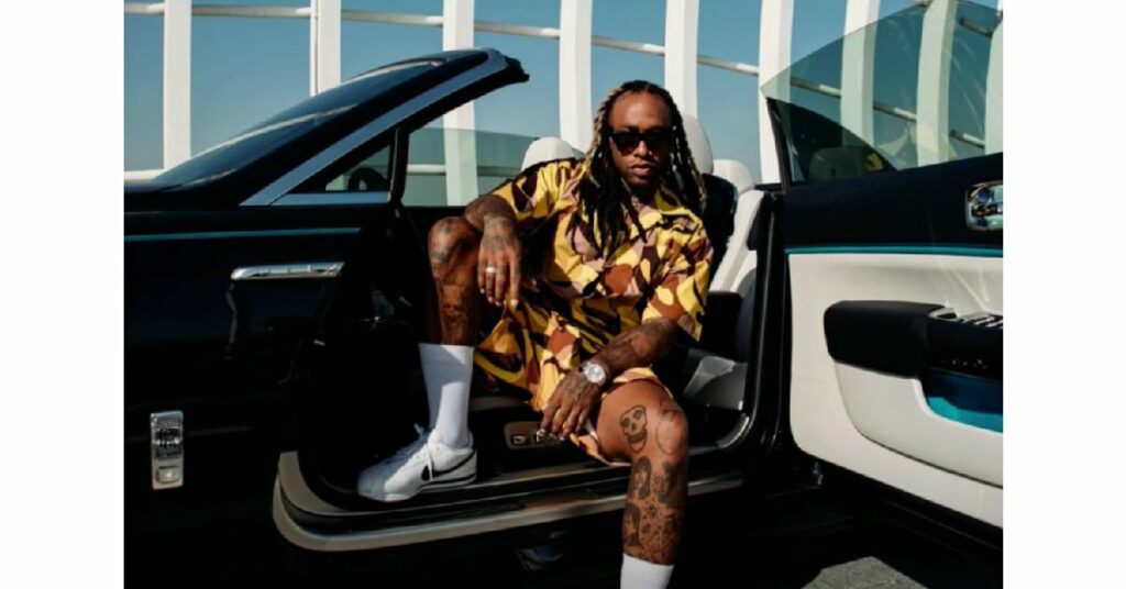 Ty Dolla Sign with his Rolls Royce Dawn