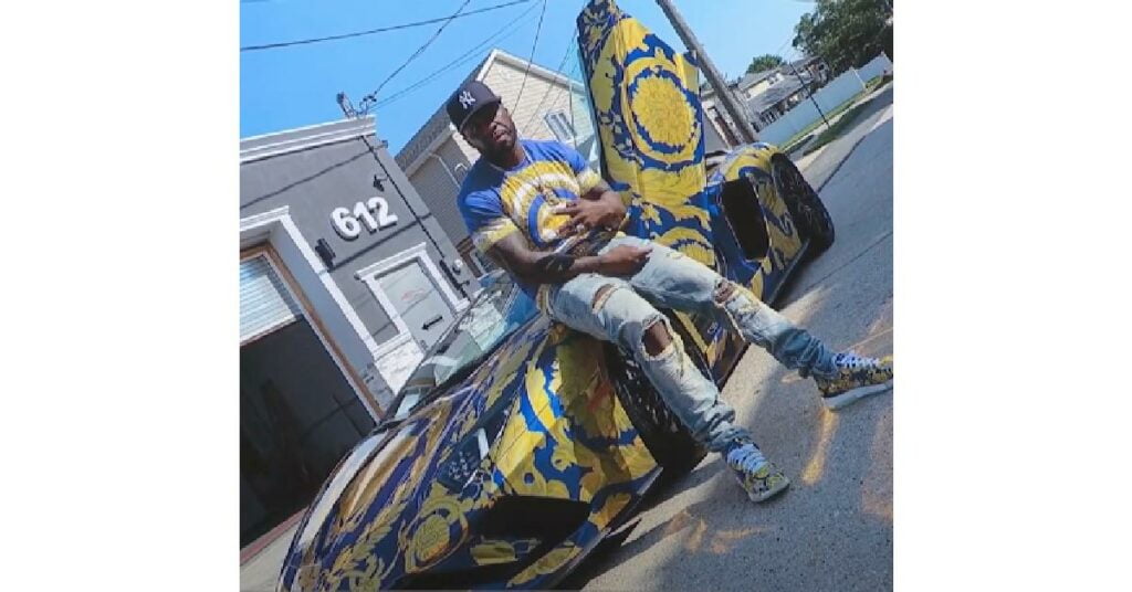 50 Cent with his Lamborghini Aventador Roadster