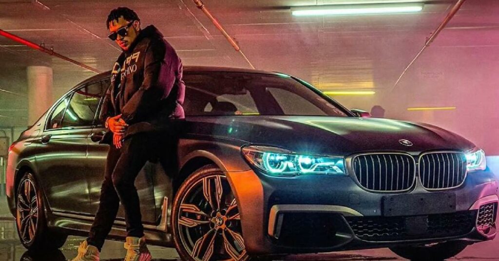 AKA with his BMW 760i