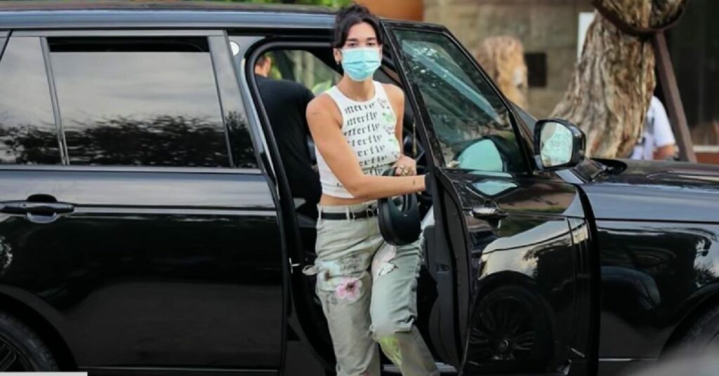 Dua Lipa with her Range Rover SV Autobiography