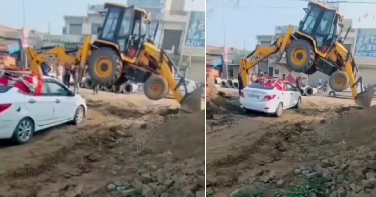 JCB lifts itself up to let a Hyundai Verna pass underneath it.