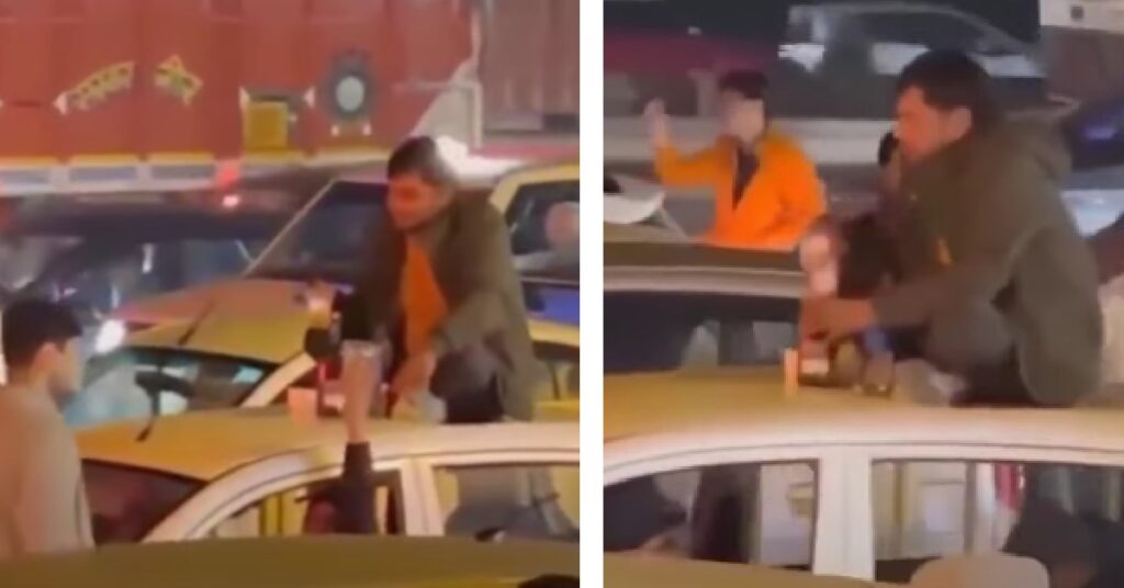 Man Starts Drinking on the Roof of a Moving Car in Delhi NCR