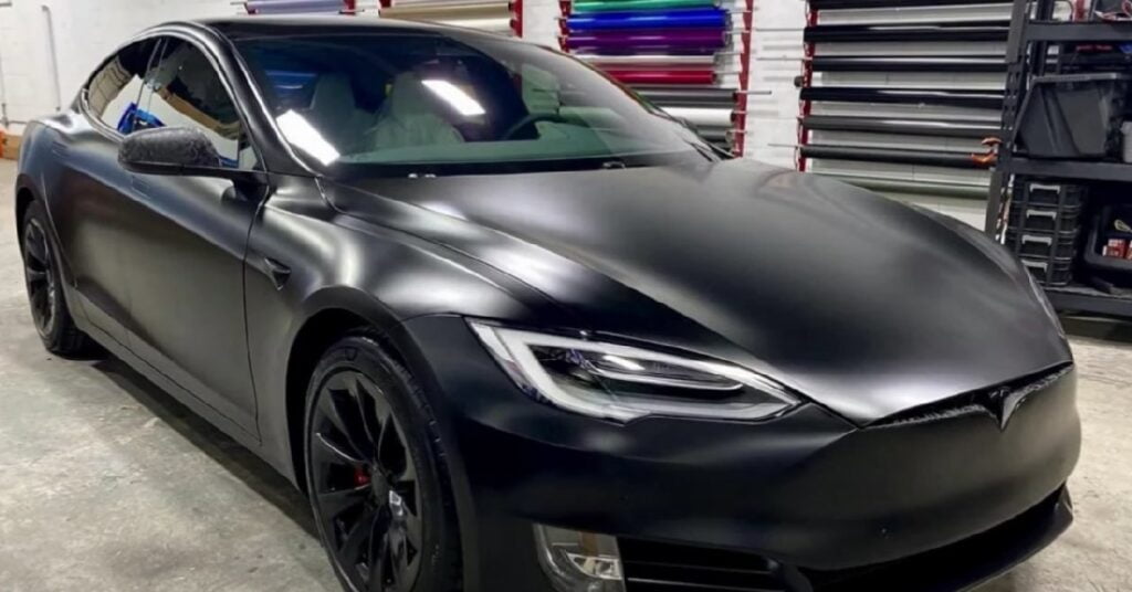 MKBHD with his Tesla Model S