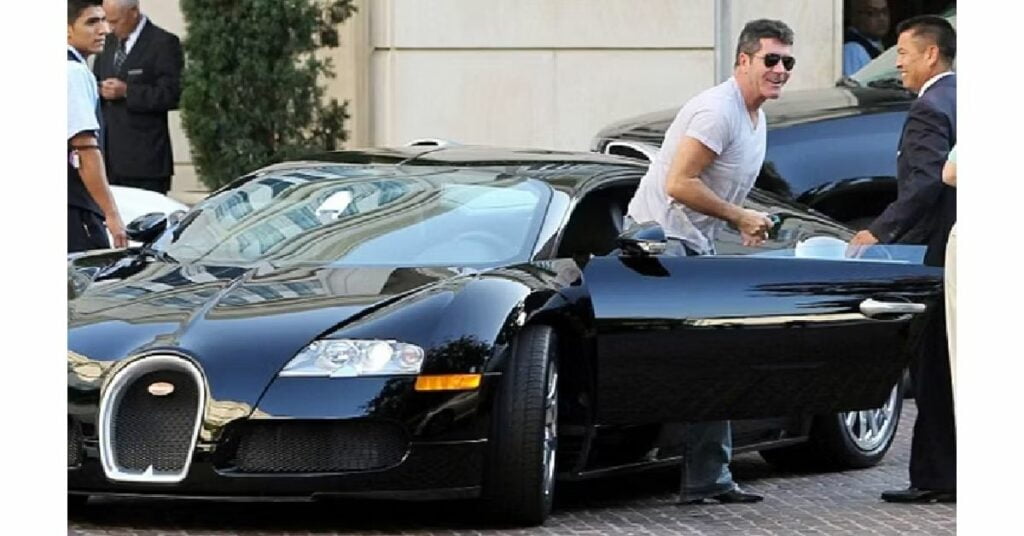 Simon Cowell with his Bugatti Veyron