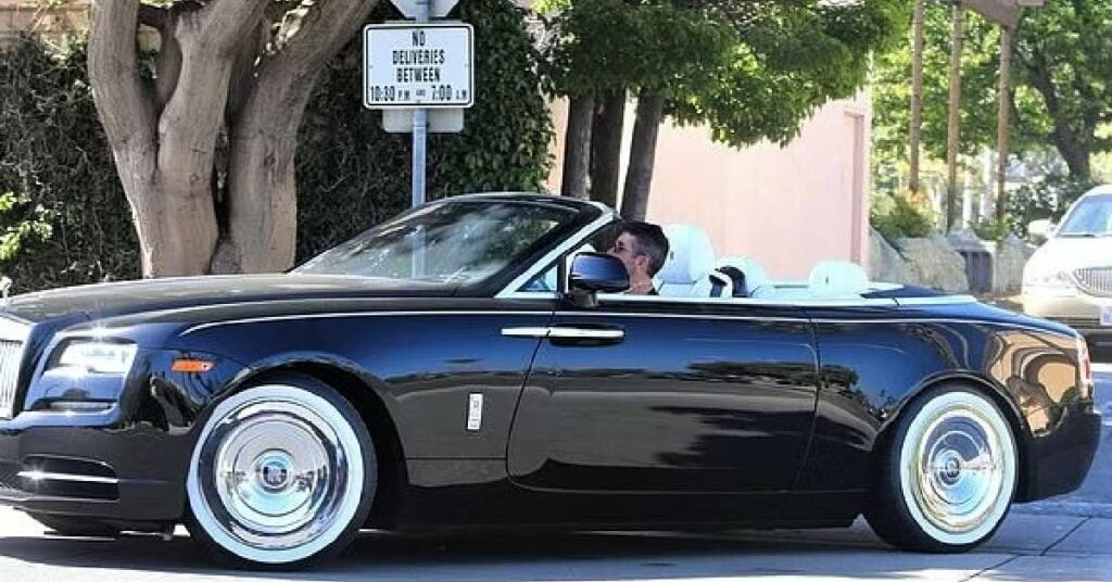 Simon Cowell with his Rolls Royce Phantom Drophead Coupe