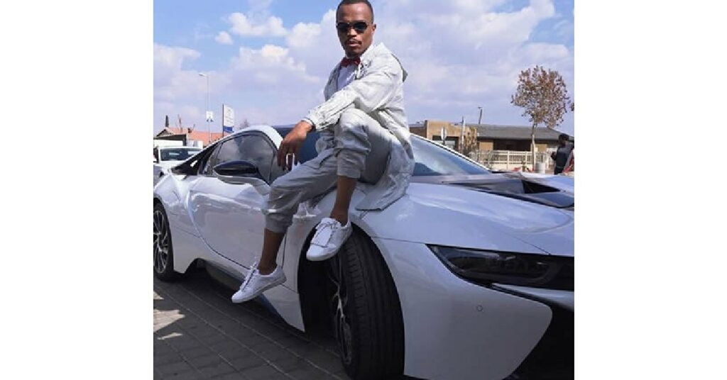 Somizi Mhlongo with his BMW i8