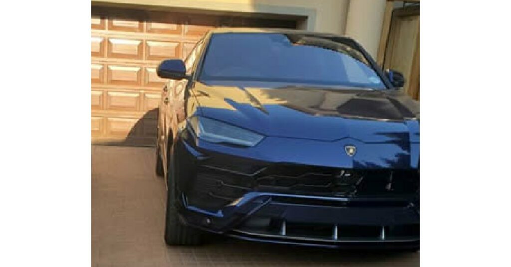 Somizi Mhlongo with his Lamborghini Urus