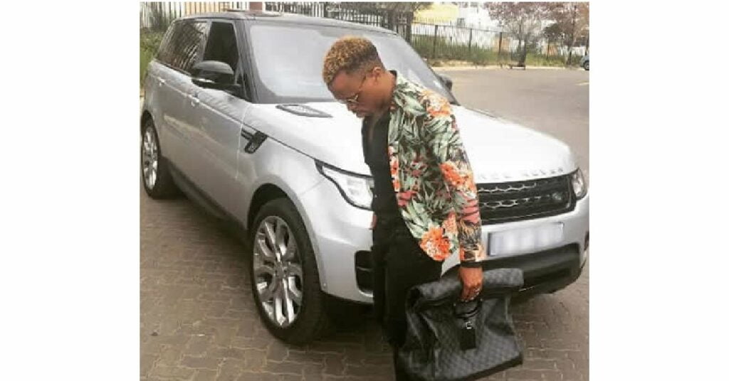 Somizi Mhlongo with his Range Rover Sport