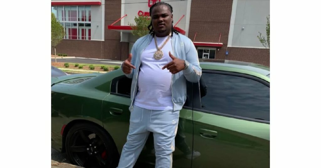 Tee Grizzley with his Dodge Charger SRT Hellcat