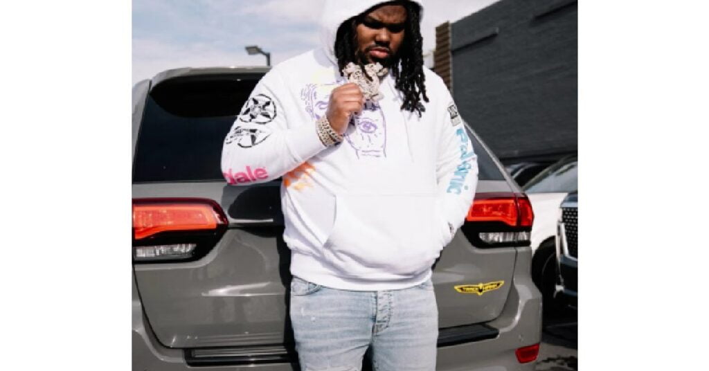 Tee Grizzley with His Jeep Grand Cherokee Trackhawk