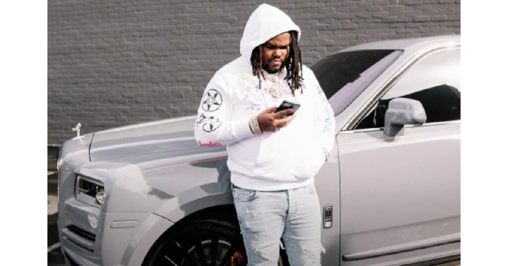 Tee Grizzley with His Rolls Royce Cullinan