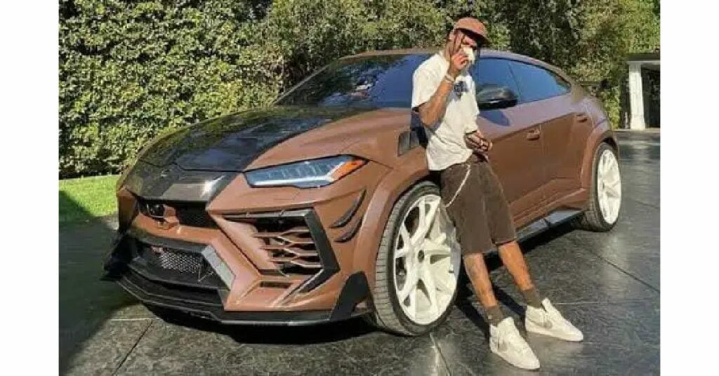 Travis Scott with his Lamborghini Urus