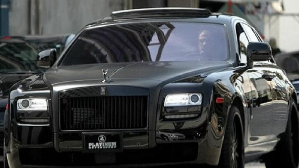 David Beckham with His Rolls Royce Ghost