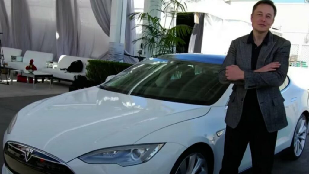 Elon Musk with his Tesla Model S