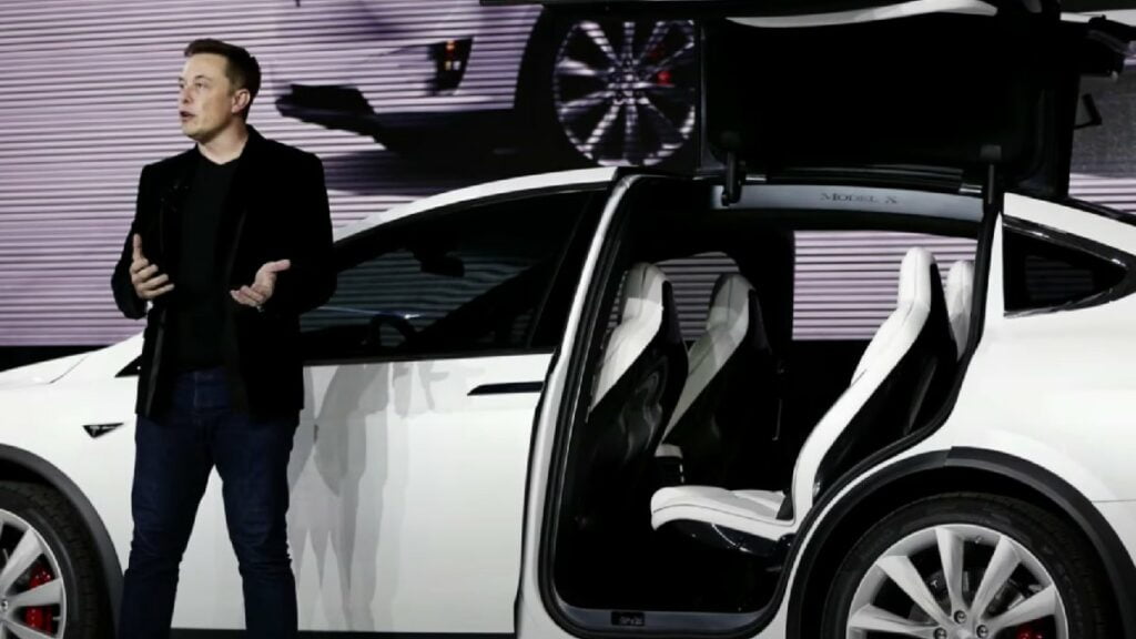 Elon Musk with his Tesla Model X