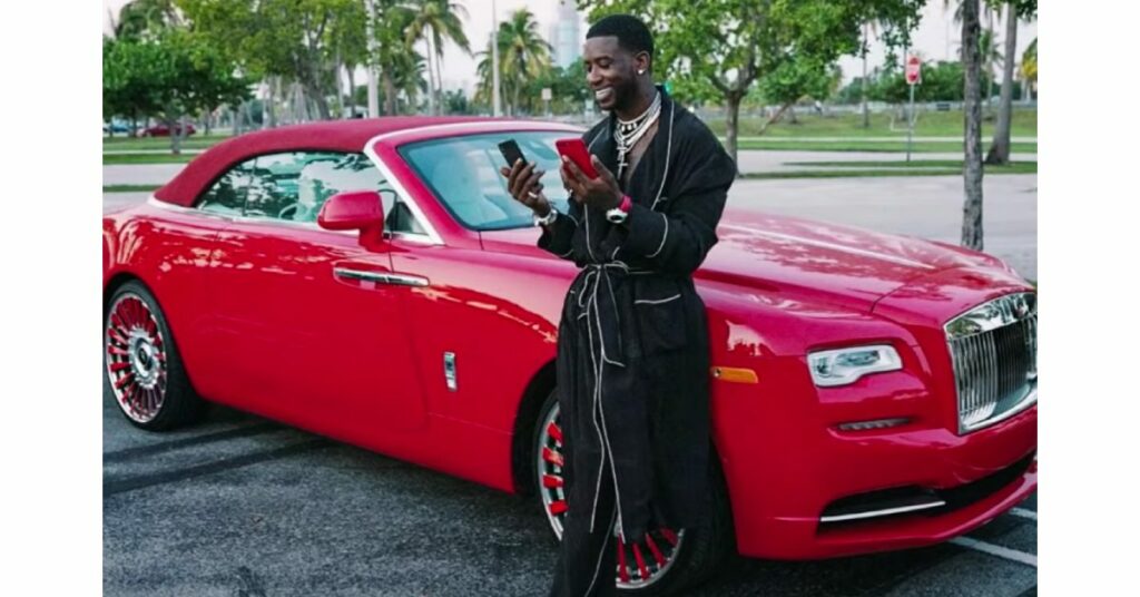 Gucci Mane with his Rolls Royce Dawn