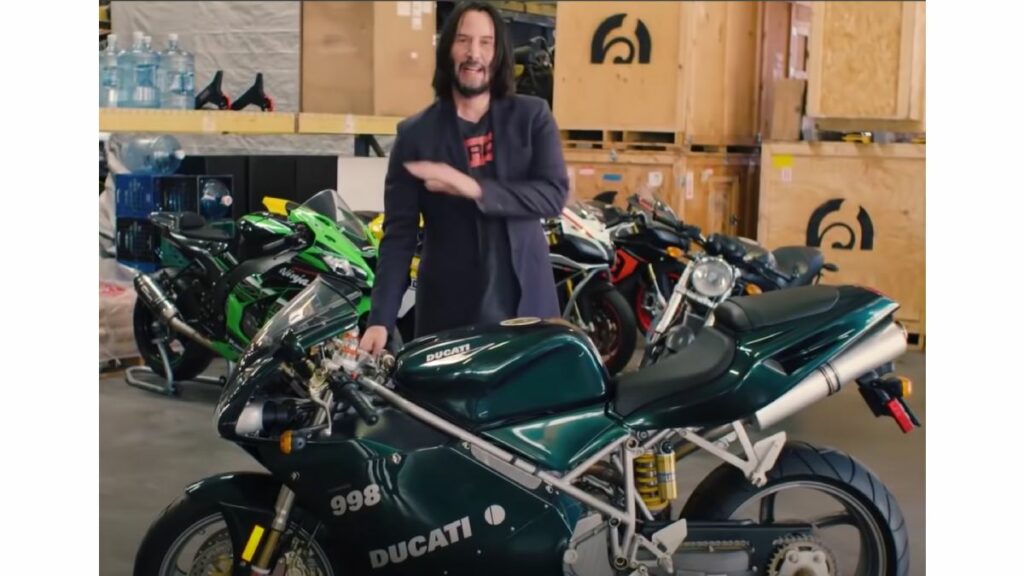 Keanu Reeves with his Green Ducati from Matrix: Reloaded