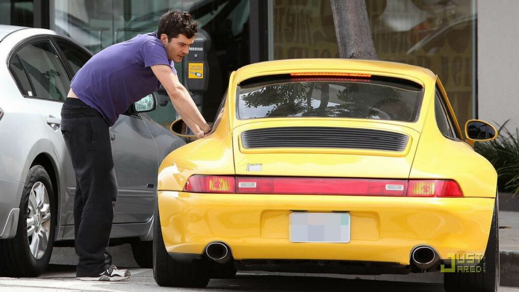 Orlando Bloom with his Porsche