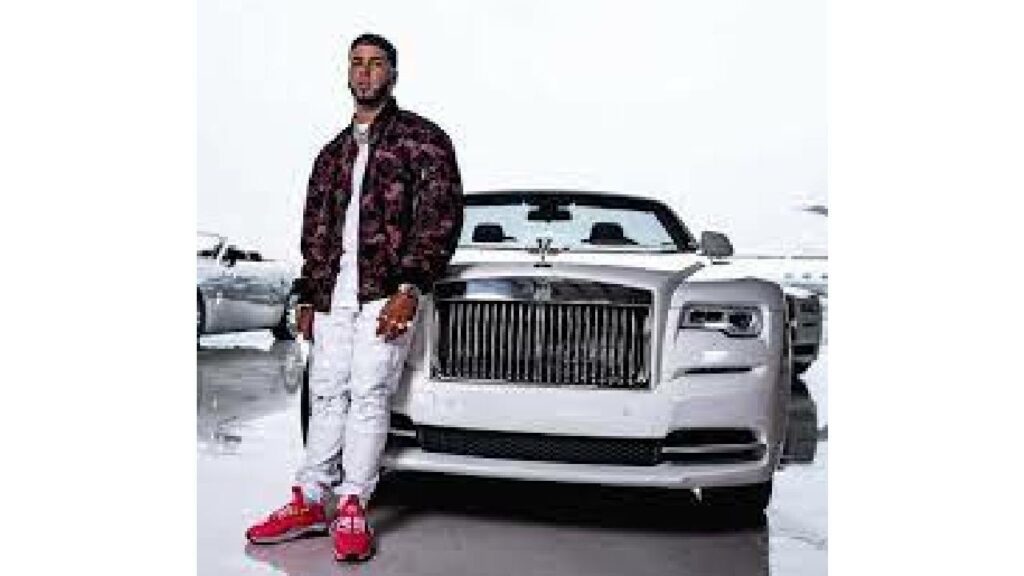 Anuel AA with his Rolls Royce Wraith