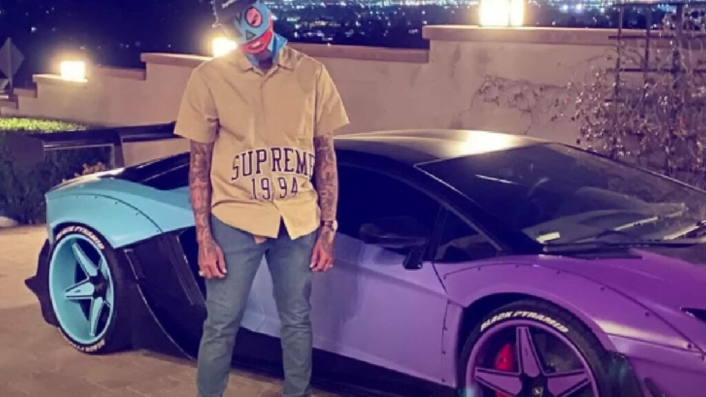 Chris Brown with his Lamborghini Aventador