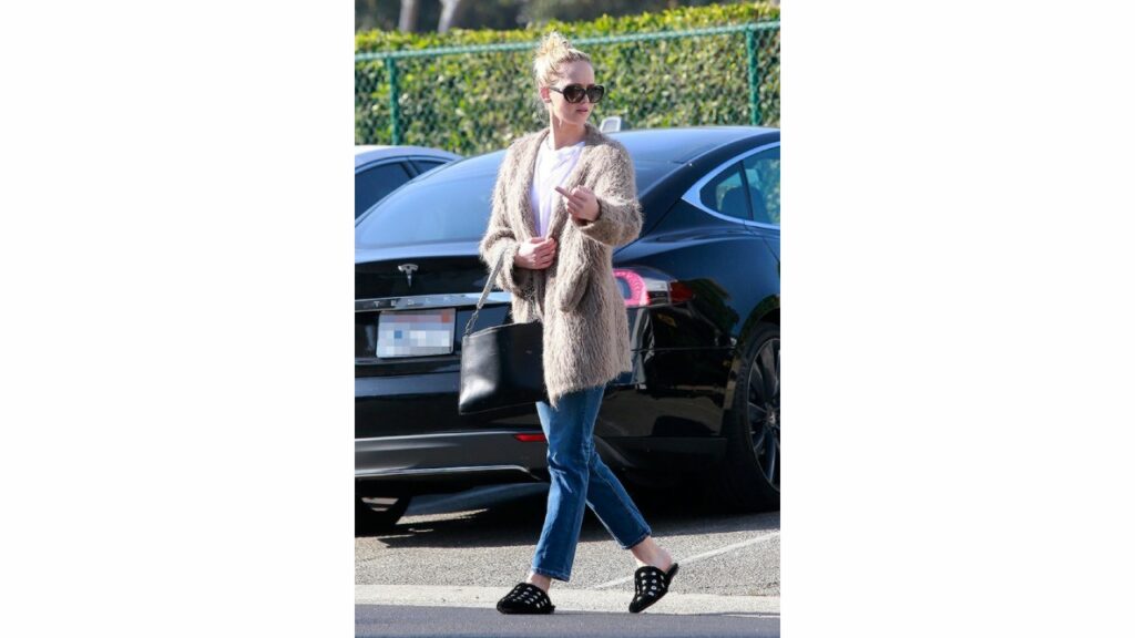 Jennifer Lawrence with her Tesla Model S