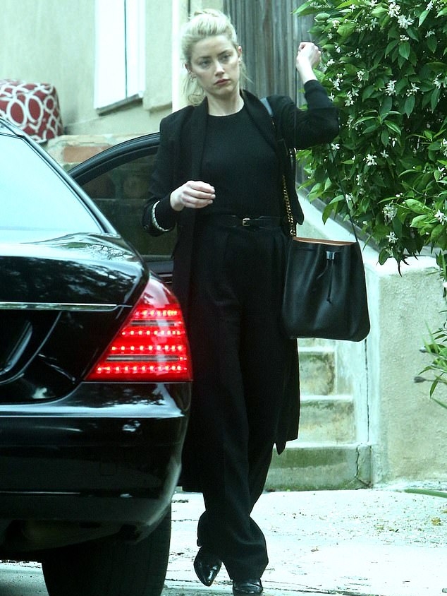 Amber Heard with Her Mercedes S class