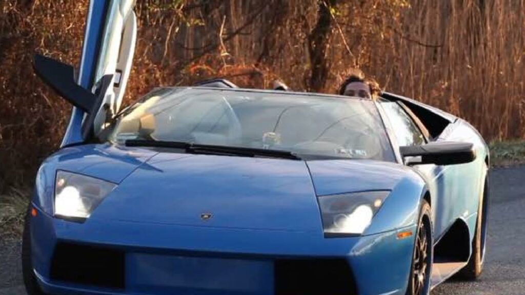 Bam Margera with his Lamborghini Murcielago