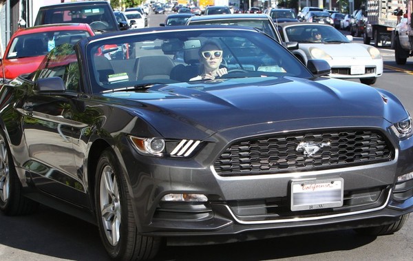 Emma Roberts with her Ford Mustang