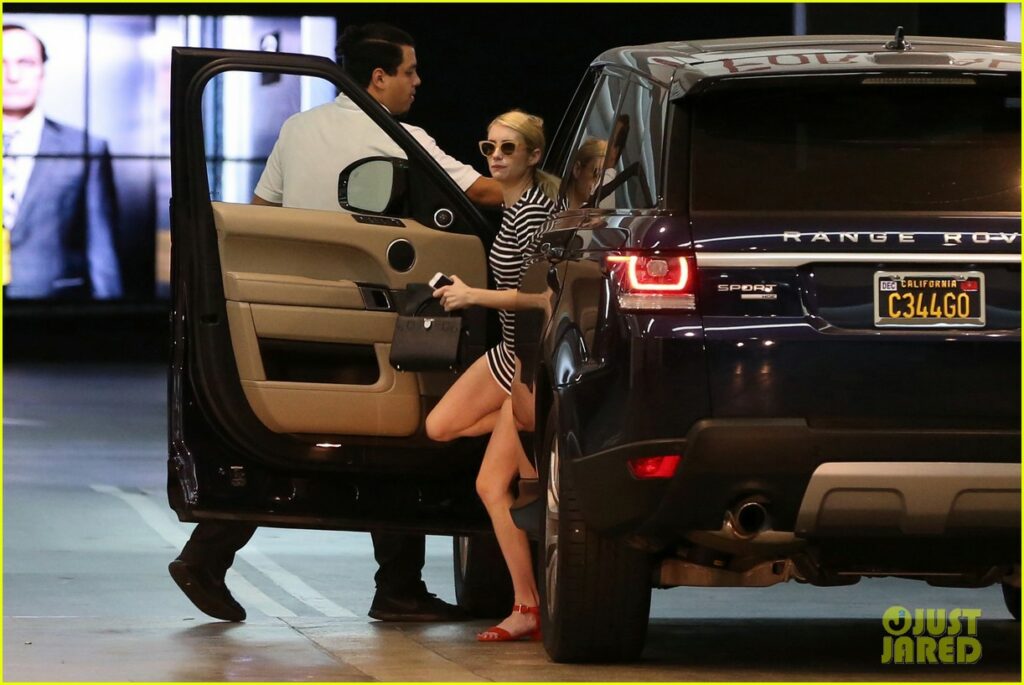 Emma Roberts with Her Range Rover