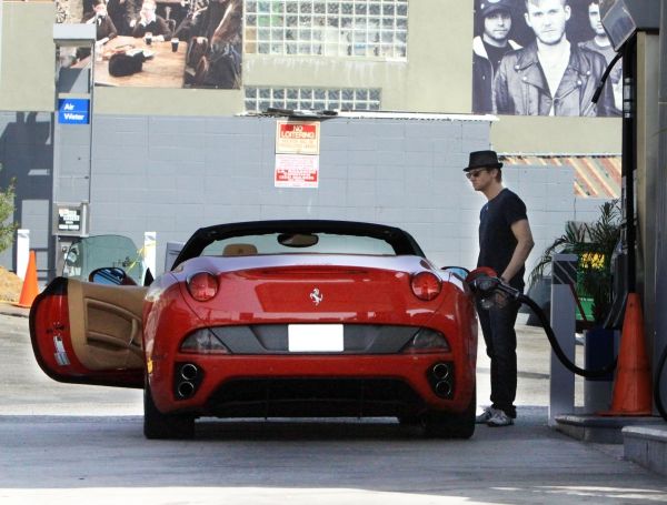 Jeremy Renner with His Ferrari California