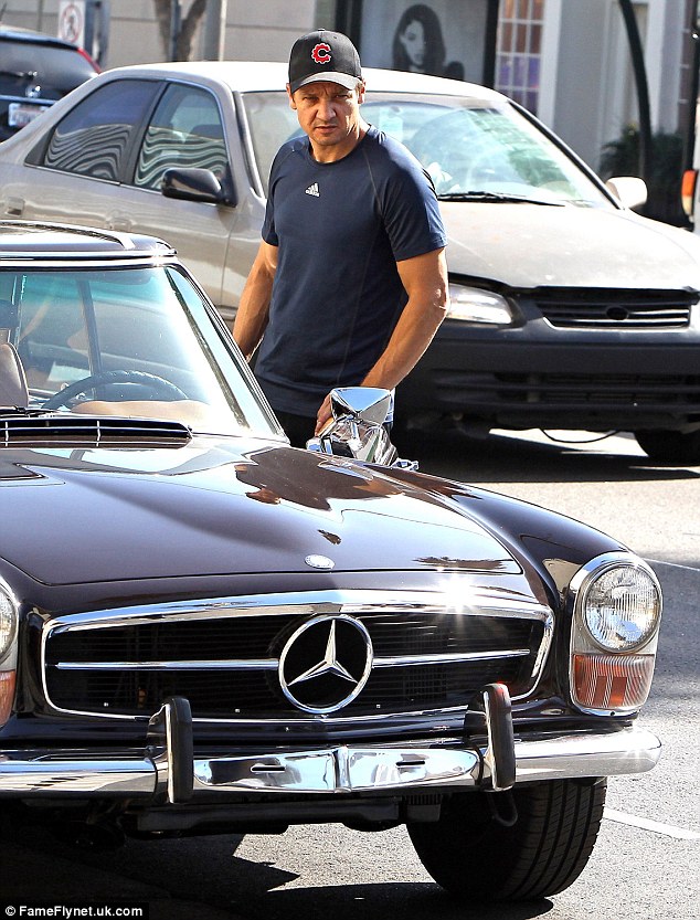 Jeremy Renner with His Mercedes W13