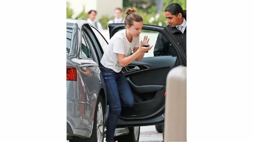 Millie Bobby Brown with Her Audi A6