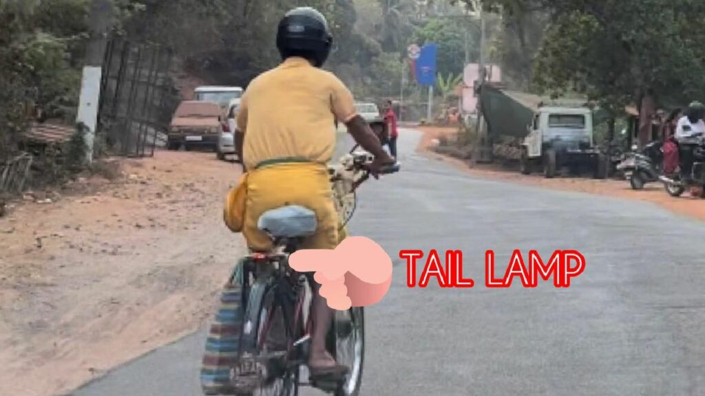 Old Man Riding Bicycle with Helmet and Taillamp