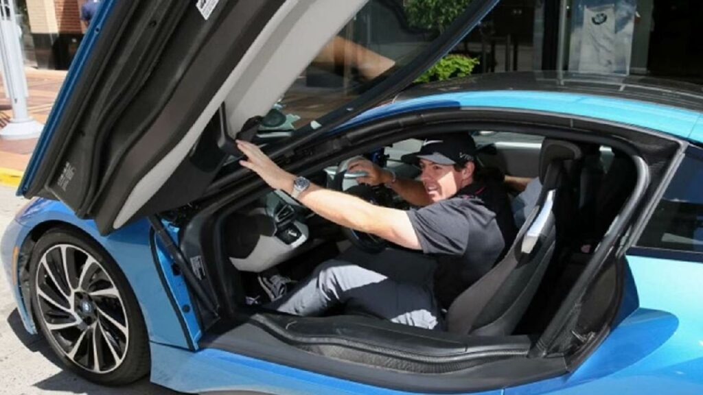 Rory Mcllroy with his BMW i8