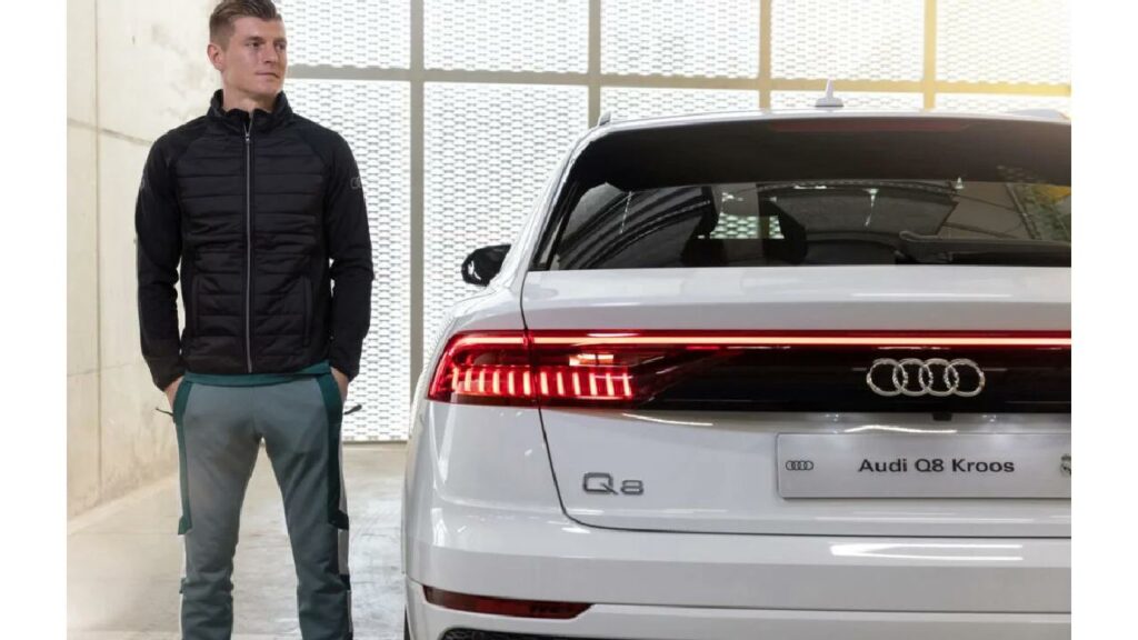 Toni Kroos with his Audi Q8